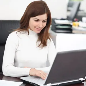 woman using laptop computer