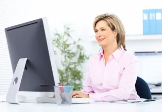 woman using computer